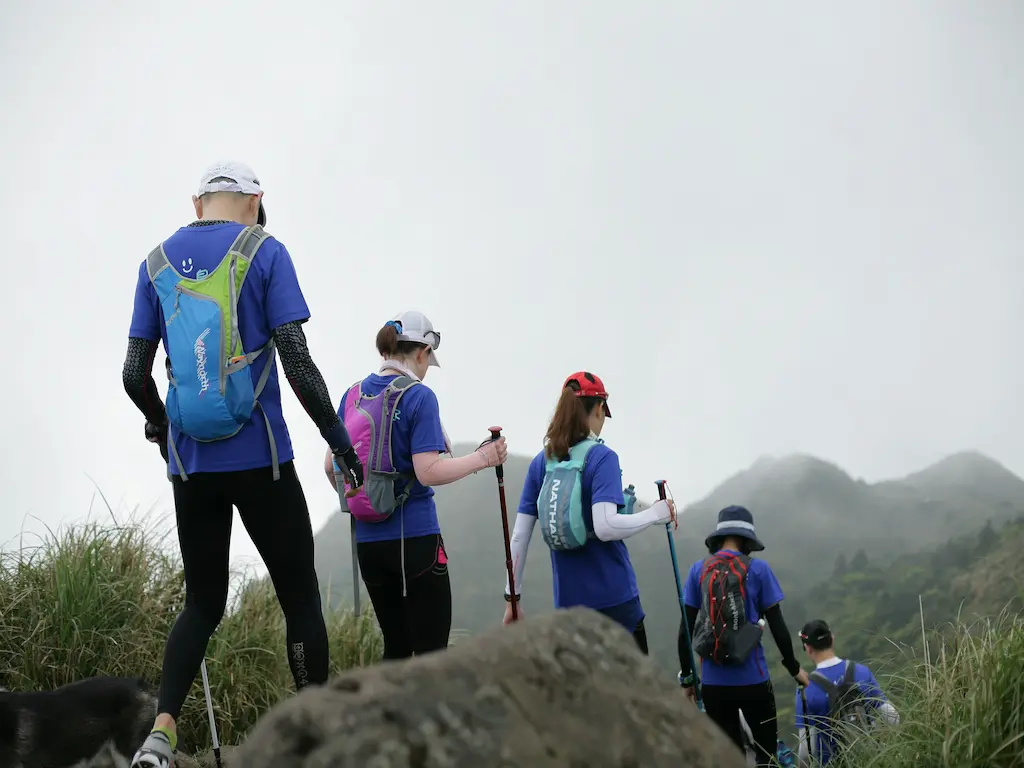 people walking along a hiking trail